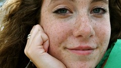 Woman faces freckles