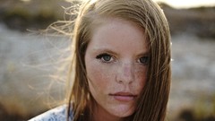 Woman faces freckles