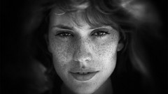 Woman faces freckles