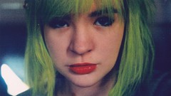 Woman faces green hair