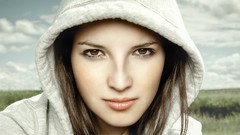 Woman faces hooded