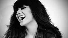 Woman faces laughing Jameela Jamil