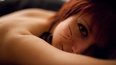 Woman faces lying down