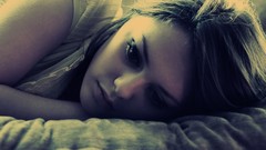 Woman faces lying down