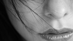 Woman faces monochrome artwork