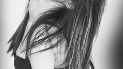 Woman faces monochrome boobs