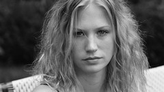 Woman faces monochrome curly hair