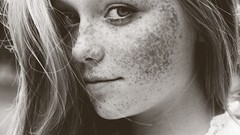 Woman faces monochrome freckles