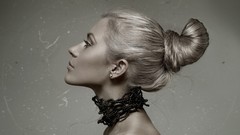 Woman faces necklaces