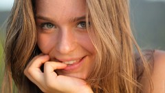 Woman faces outdoors blondes green eyes brunettes Lily C biting 