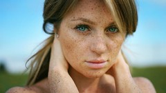 Woman faces outdoors blue eyes freckles redheads