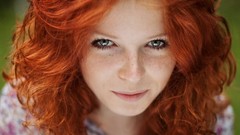 Woman faces outdoors green eyes freckles redheads