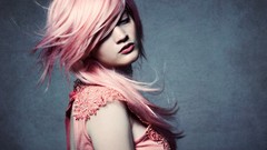 Woman faces pink hair