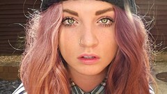 Woman faces pink hair piercings models boobs