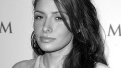 Woman faces Sarah Shahi