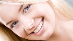 Woman faces smiling