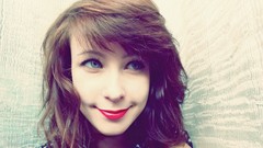 Woman faces smiling blue eyes red lipstick redheads