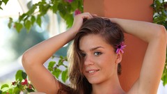 Woman faces smiling brunettes flower in hair Lily C
