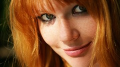 Woman faces smiling green eyes redheads