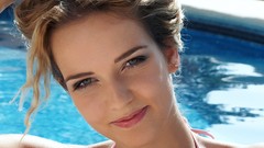 Woman faces swimming pools