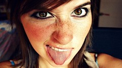 Woman faces tongue brown eyes brunettes freckles