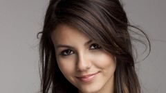 Woman faces victoria justice smiling