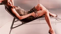 Woman Famke Janssen chairs