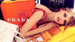 Woman fashion blondes blue eyes purses models lying down Prada 