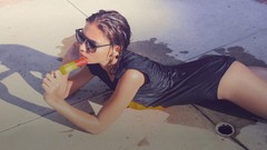 Woman fashion sunglasses models swimsuits popsicles wet clothing