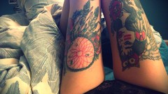 Woman feathers gap legs tattoos panties