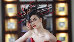 Woman feathers red dress