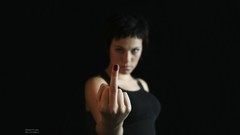 Woman fingers middle finger