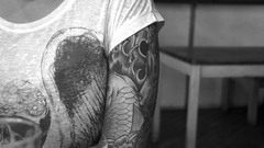 Woman fish arm tattoos