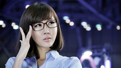 Woman glasses blue background asians brunettes short hair bangs 