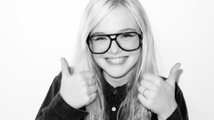 Woman glasses faces blondes smiling thumbs up elle fanning 