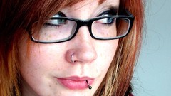 Woman glasses freckles piercings redheads hipster