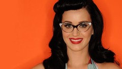 Woman glasses lips katy perry smiling singers orange background 