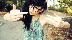 Woman glasses middle finger