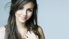 Woman gray background faces Actress victoria justice smiling 