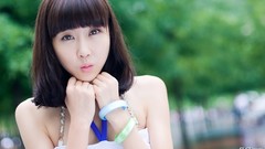 Woman green background asians brunettes short hair bangs models 