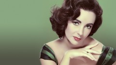 Woman green background vintage Actress Elizabeth Taylor