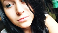 Woman green eyes black hair