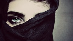 Woman green eyes black hair