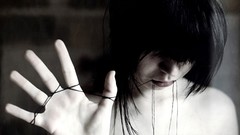 Woman hands emo black hair