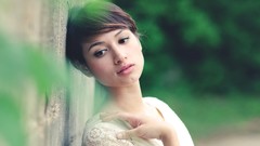 Woman hands faces outdoors asians brunettes short hair models