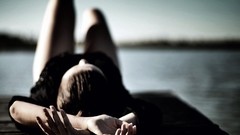 Woman hands lakes lying down