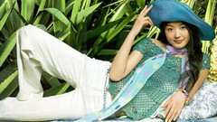 Woman hats Celebrity Actress asians black hair lying down 