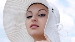 Woman hats faces brunettes low-angle shot