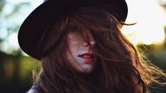 Woman hats faces hair in face