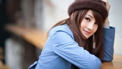 Woman hats faces outdoors asians brunettes